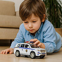 Машинка поліція Toyota Land Cruiser 1:32 TK Group – інерційна, світло звук, відчиняються двері 41153/2, фото 2