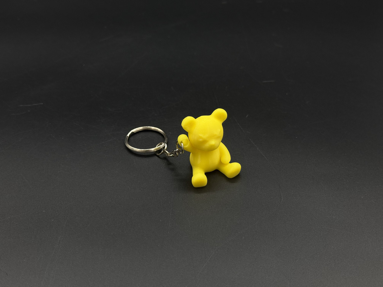 Брелок-підвіска для ключів сумки рюкзака 3D Ведмедик жовтий. 33х28мм
