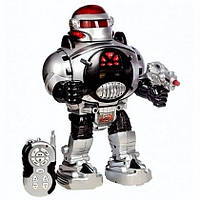 Робот М 0465 U/R "Космический воин", радиоуправление, стреляет дисками, свет, звук, танцует, бластер.