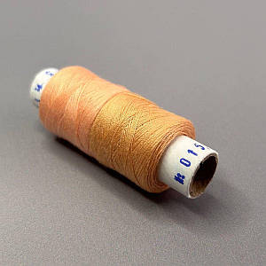 015/123 Нитки в котушках 40/2 , половинки (котушка 2х75м)