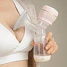 Електричний молоковідсмоктувач із соскою, 150 мл, від USB, Zhibao / Молоковідсмоктувач із пляшечкою / Молоковідсмоктувач двофазний, фото 2