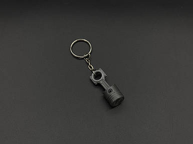 Брелок-підвіска для ключів сумки рюкзака 3D Поршень сірий. 42х16мм