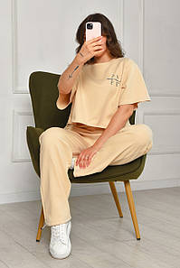 Спортивний костюм жіночий бежевого кольору 204509P