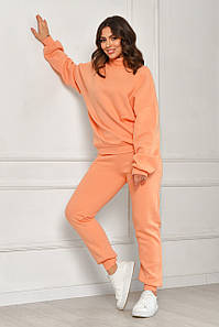 Спортивний костюм жіночий на флісі персикового кольору 204521P