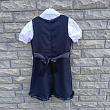 Чорний шкільний сарафан для дівчинки з рюшками внизу та завищеним поясом, фото 6