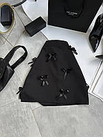 Женская трендовая юбка с бантиками костюмка