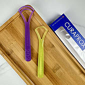 Набір скребків для язика Curaprox (фіолетовий та салатовий), 2 шт