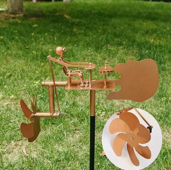 Вуличний декор для саду з металу декоративні млини вітряні у вигляді барабанщика, висота 50 см, фото 1