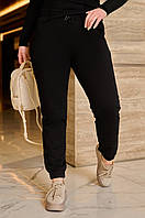 Спортивні жіночі штани з манжетами трикотажні демісезонні великих розмірів чорні