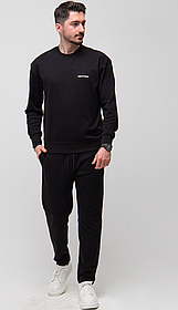 Чоловічий спортивний костюм із кофтою без капюшона та звуженими штанами в чорному кольорі