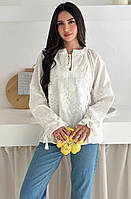 Жіноча блуза вишиванка із зав'язками на рукавах молочна
