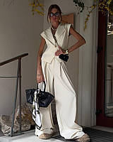Стильний жіночий костюм жіночий широкі штани та жилетка на ґудзику в кольорі айворі 42-44 46-48