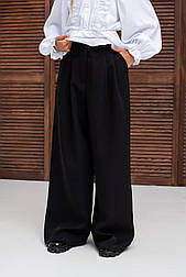 Штани палацо з костюмної тканини на дівчинку в чорному кольорі