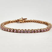 Браслет золотий жіночий з камінням рожевого кольору фіанітами