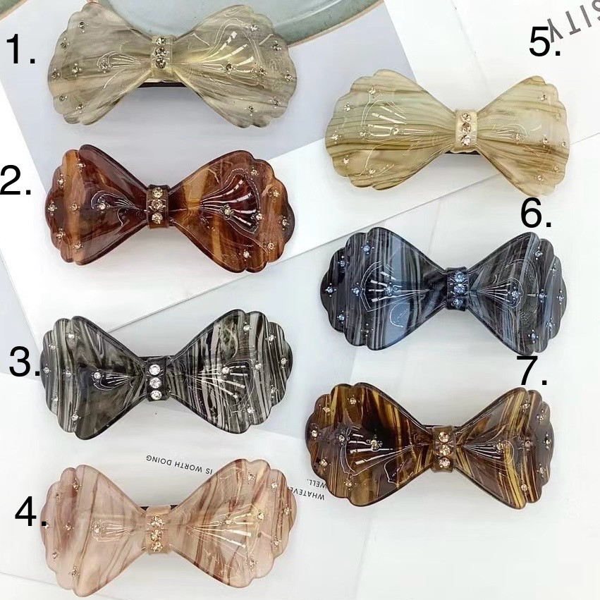 Шпилька автомат для волосся французький пластик бантики зі стразами різні кольори розмір 9.5 см висота 5 см