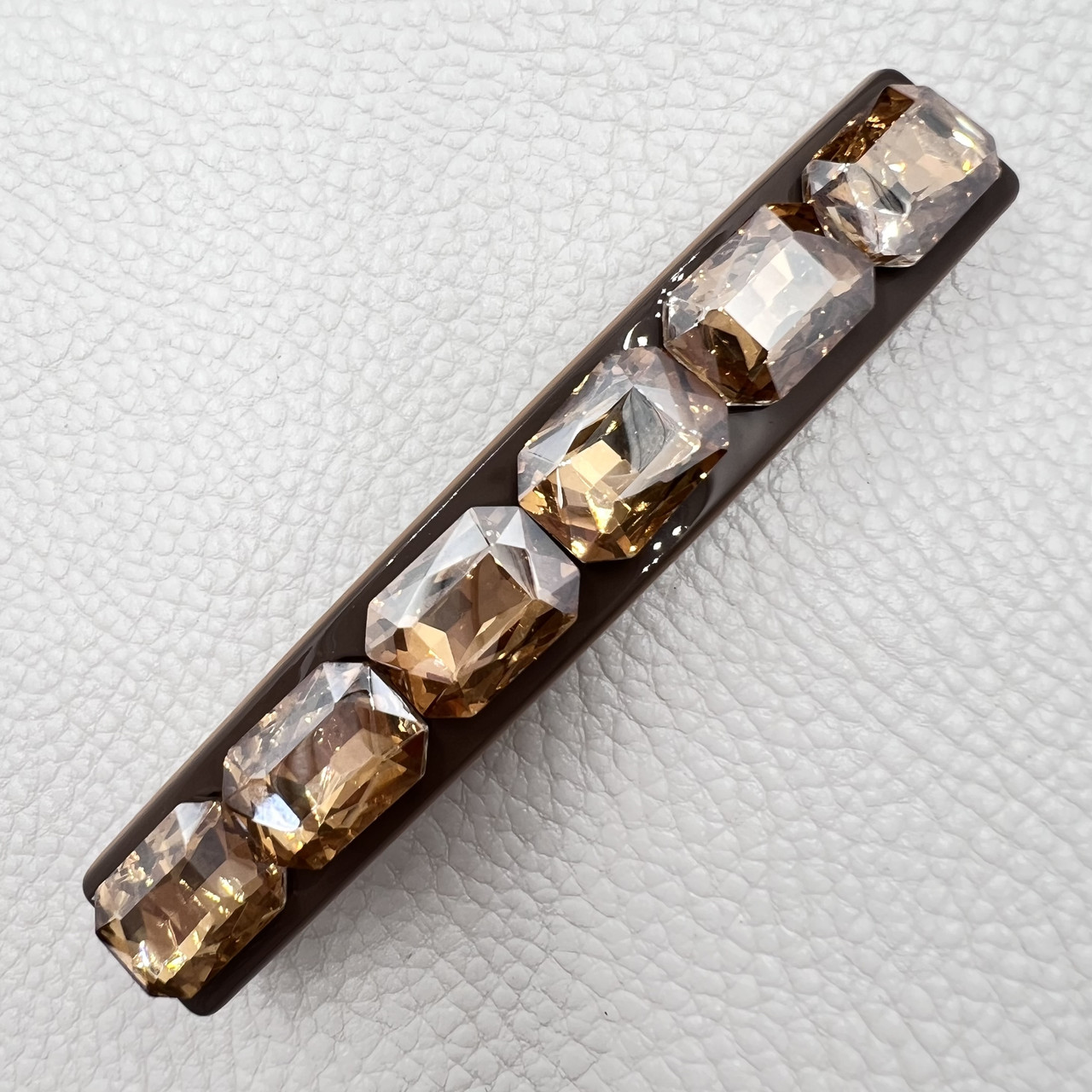 Шпилька автомат для волосся з жовтими кристалами, що переливаються, розмір 9 см висота 1.5 см