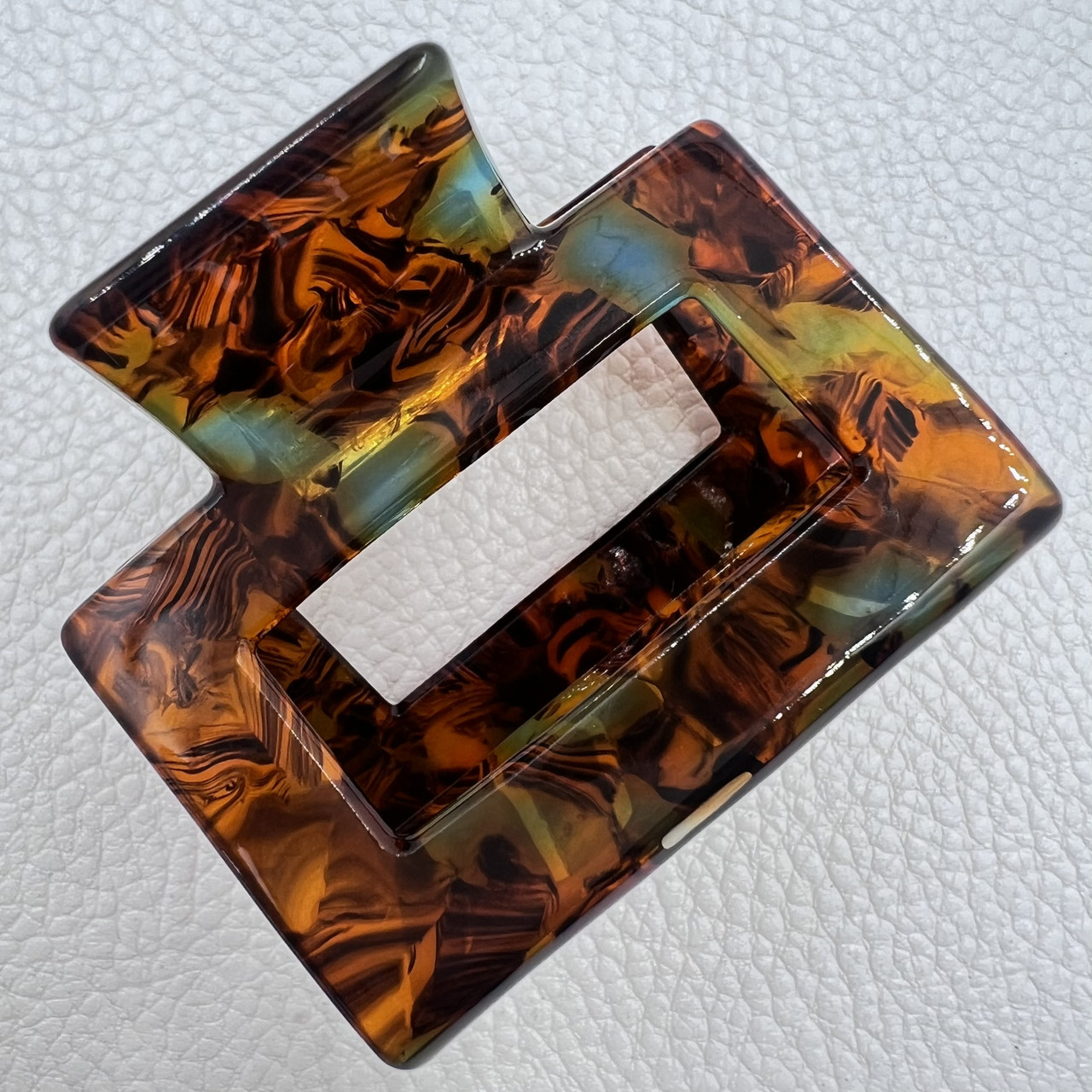 Краб для волосcя акрил глянсовий коричневого кольору з зеленими вкрапленнями довжина 4.5 см ширина 5.5 см