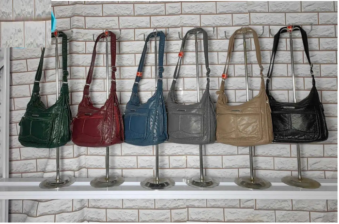 Сумка жіноча варенка на блискавці з кишенями зі штучної шкіри в різних варіантах Zhenya, фото 1