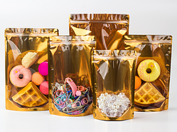 Дой-пак zip-замок пакувальний пакет золото з прозорим вікном  22х15х5 см