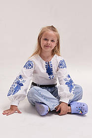 Стильна вишиванка для дівчинки із синьою вишивкою жар-птиці