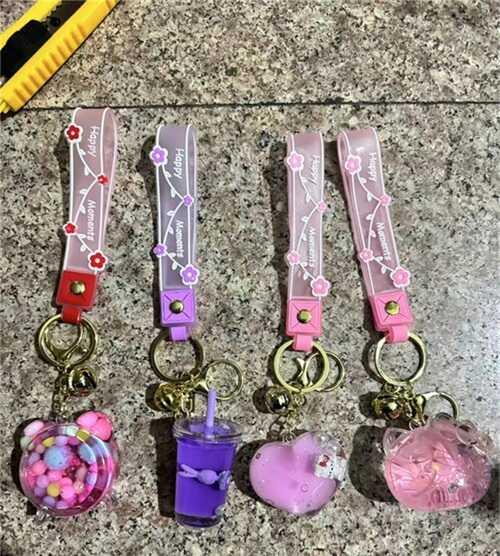 Брелок C 69929 ЦІНА ЗА 12 ШТУК В УПАКОВЦІ, герой, середня висота - 5 см, металева фурнітура, наповнено рідиною, блискітки, фото 1