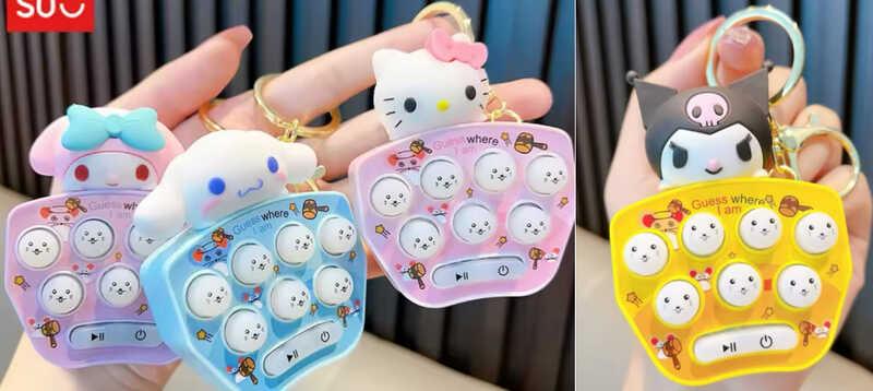 Брелок C 70879 ЦІНА ЗА 12 ШТУК В БЛОЦІ, герой, металева фурнітура, підсвічування, звуки, на батарейках, пальчикова гра, фото 1