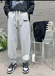 Дитячі спортивні штани з манжетами внизу чорного кольору в розмірі 27 і 31