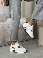 Жіночі білі кросівки