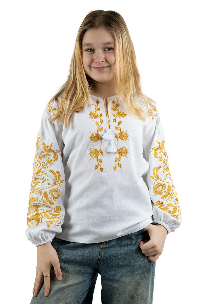 Вишиванка для дівчинки білого кольору з жовтим квітковим орнаментом гладдю і пишними рукавами 110–164 см