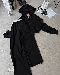 Стильний жіночий осінній базовий прогулянковий костюм з брюки логотипом на затяжках кофта на блискавці двонитка