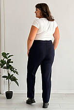 Штани для повних жінок сині зі щільного трикотажу на осінь без застібок з кишенями, фото 3