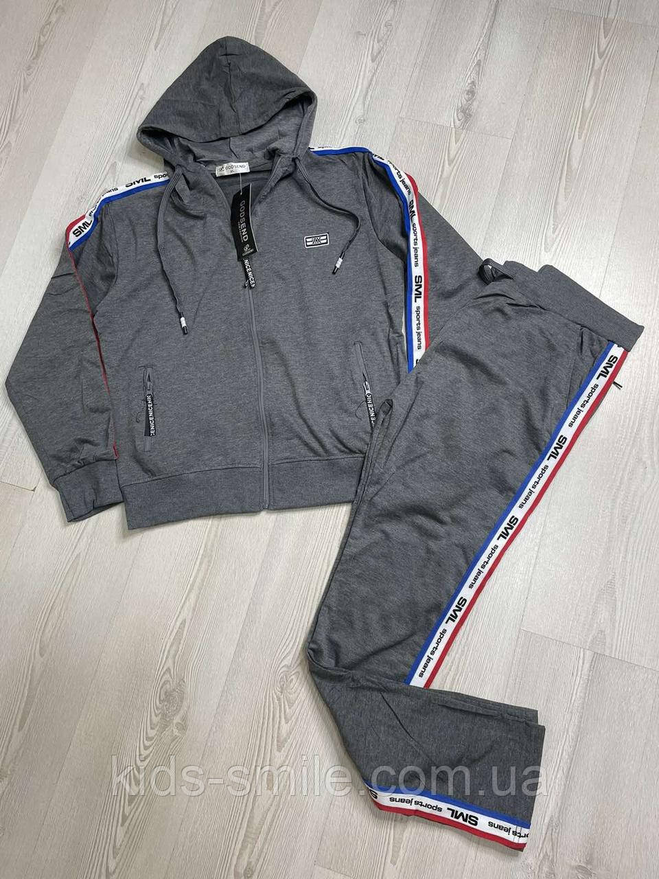 Спортивні костюми жіночі