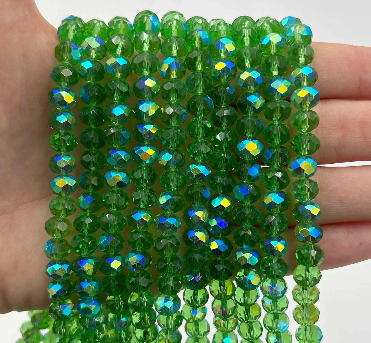 Намистини рондель / 8*6 мм / Кількість: 60-65 шт / Прозорий / з АБ бочком / Зелений №309, фото 1