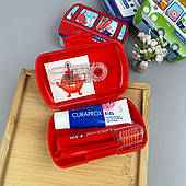 Дорожній набір Curaprox Kids Travel Set Червоний від 6 років -  щітка, паста, йоршики для гігієни зубів у подорожах