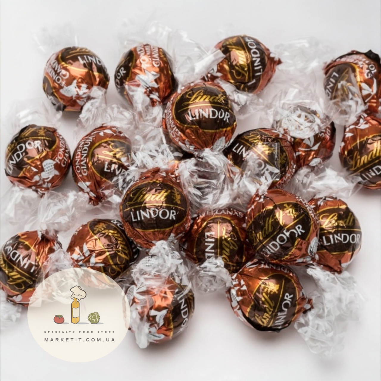 Шоколадні цукерки Lindt Lindor Hazelnut, з подрібненим фундуком, вагові, фото 1