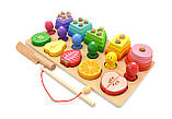 Логічна дерев'яна дошка 74534 сортер пірамідка розрізні фрукти риболовля форми кольори, фото 3