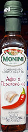 Олія оливкова з часником і перцем Monini  250 мл.