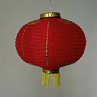 Червоний китайський підвісний паперовий ліхтарик з бахромою і крупними золотими ієрогліфами