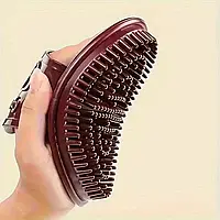 Силіконова масажна щітка середньої жорсткості, зручна форма з ремінцем для руки, ідеальна для догляду за тілом у душі.