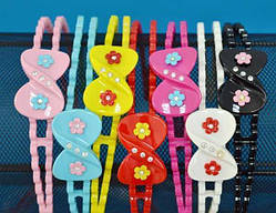 Обруч для волосся кольоровий пластик бант стрази