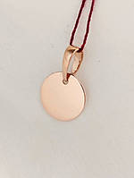 Золотий кулон монета