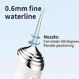 Іригатор для зубів 300 мл із п'ятьма насадками A12 чорний і білий, фото 7