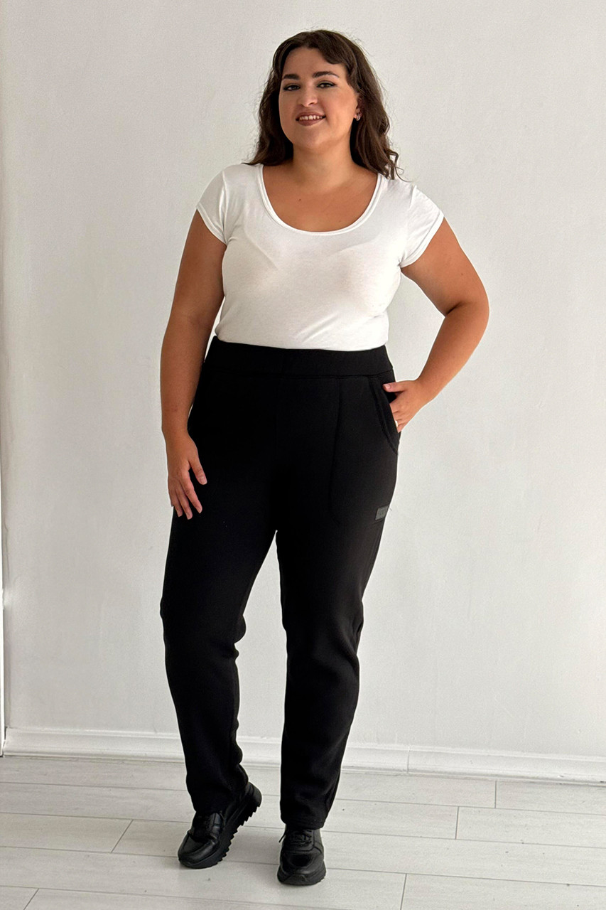 Теплі жіночі штани великого розміру на флісі з кишенями гумка в талії зимові чорні