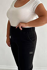 Теплі жіночі штани великого розміру на флісі з кишенями гумка в талії зимові чорні, фото 4