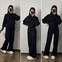 Жіночий в язаний костюм двійка з ангорки з укороченою кофтою та широкими штанами