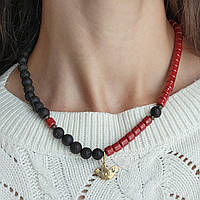 Намисто з кераміки та лави «Два світи – одне кохання». В центрі наммиста - латунна підвіска пташка.