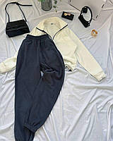 Модний, теплий жіночий костюм