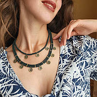 Зґарда "Гуцульські зоряниці". Трьохрядне керамічне намисто з авторською литою латунною чепрагою та десятьма хрестиками - зірочками