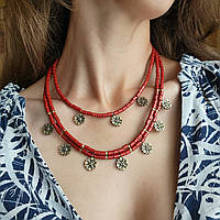 Зґарда "Гуцульські зоряниці". Трьохрядне керамічне намисто з авторською литою латунною чепрагою та десятьма хрестиками - зірочками