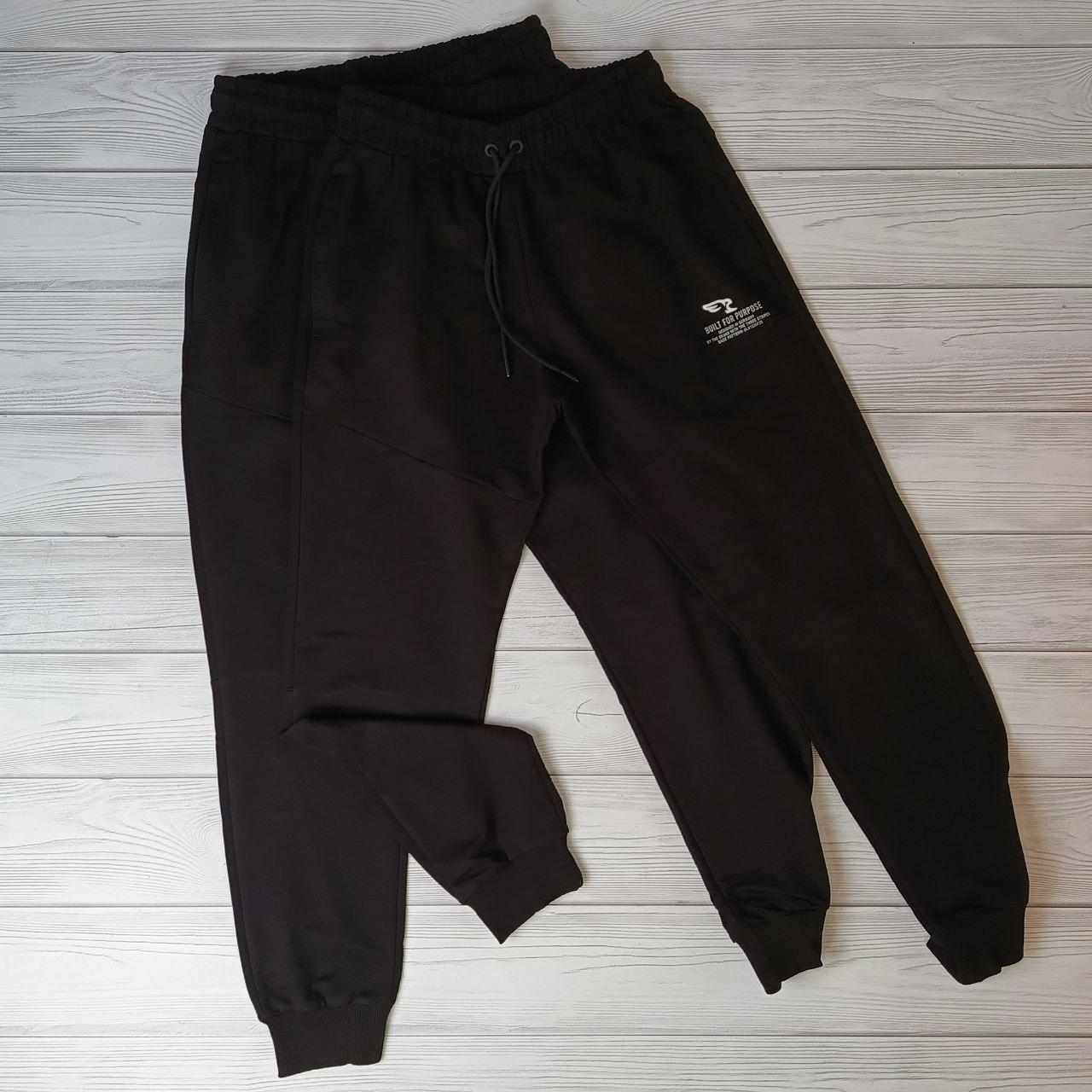 Чоловічі спортивні штани чорного кольору з манжетом, фото 1